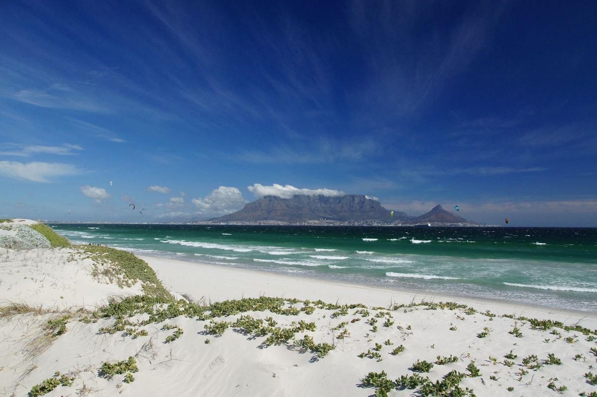 Coastal dunes near Cape Town with Table Mountain on the horizon